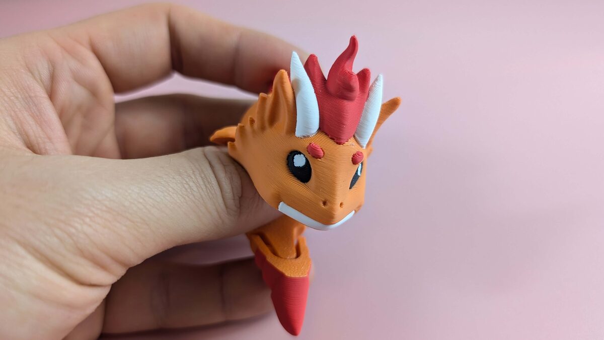 FIRE DRAGON - ARTICULATED FIGURE KEYCHAIN in Hand